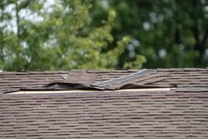 Picture of roof damage sustained during a storm.