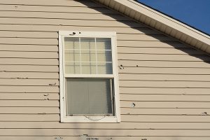 House siding damaged by hail
